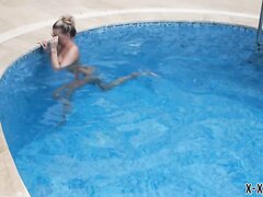 Elegant Girl In Swimming Pool
