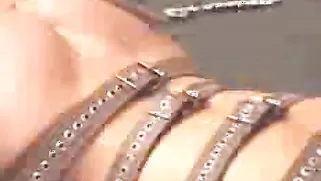 Awesome Belted Beauty With Big Boobs Gets Penetrated With Needles